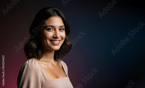 Portrait of a natural-looking beautiful woman with shoulder-length dark hair and calm expression. Left-positioned framing against soft neutral background with clear copy space on the right.