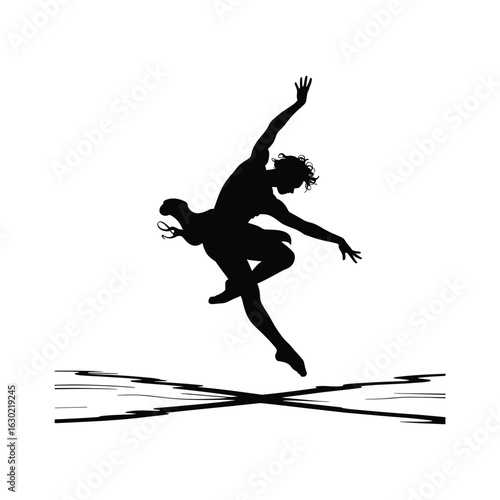 Graceful silhouette of a ballerina in mid leap