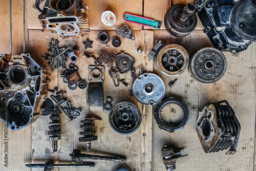 Foto Old parts of motorcycles background