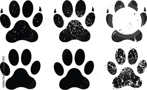 Grunge and clean dog paw print icon set, textured pet footprint vectors, black distressed animal track design, vintage logo elements