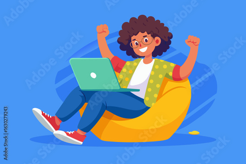 Happy person with curly hair working on a laptop while sitting on a beanbag