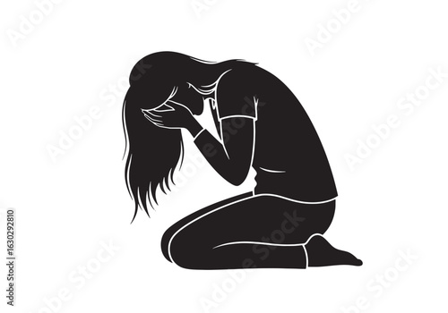 A silhouette of a sad woman kneeling on the floor, covering her face in despair and grief.
