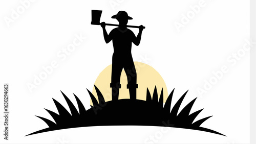 Silhouette of farmer with hat and axe standing on a hill against a rising sun in a rural landscape