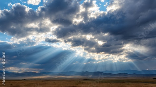 Cloud-dense sky with multiple sun rays