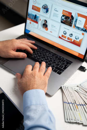 Male hands browsing online shop on laptop. Perfect for e-commerce, digital payments, shopping from home, or financial services themes.
