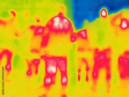 People are walking along the road towards each other. Image from thermal imager device.