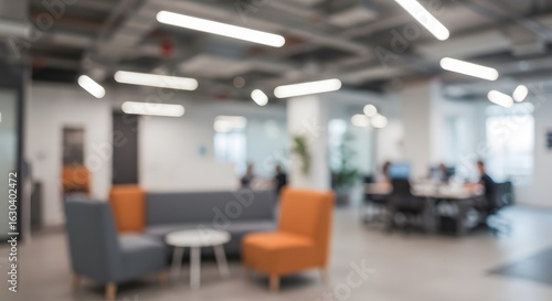 Abstract blurred interior of a contemporary corporate office or coworking space. Ideal for business backgrounds and presentations.