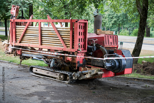 Fotografija Directional drill machine or Drilling rig stands on paved asphalt
