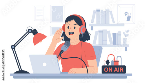 Female Podcaster Wearing Headphones Speaking Into Microphone With Laptop podcasting