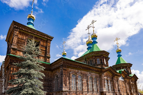 Wooden Church. Holy Trinity Cathedral in Karakol city, Kyrgyzstan. Wooden church, architecture. Kyrgyzstan Diocese of the Russian Orthodox Church