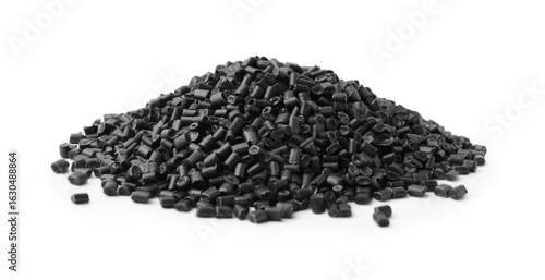 Fotografie Pile of black plastic granules isolated on white