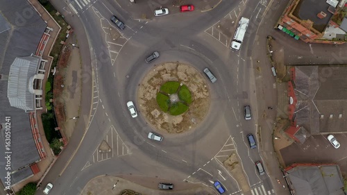 Top-down aerial of Carlisle Circus in Belfast, capturing rhythmic traffic flow