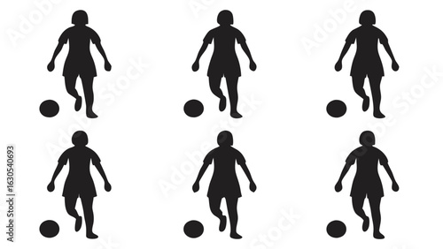 Female soccer players kicking balls football women