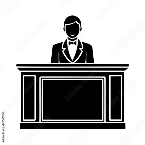 Man in Suit Standing Behind a Podium with Bow Tie Presenting Information Professionally