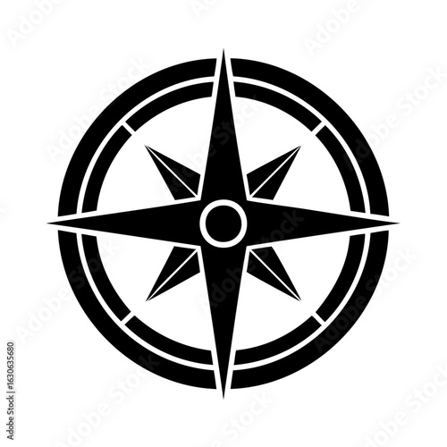 A striking black and white compass rose design symbolizing direction and exploration