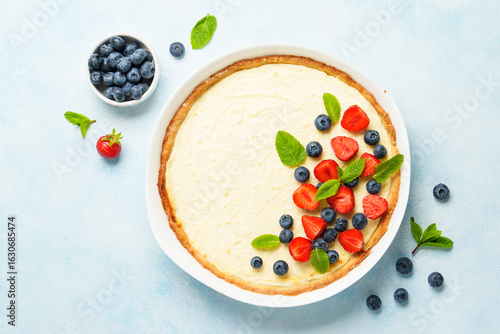 Cheesecake with fresh berries or tart with cheese.