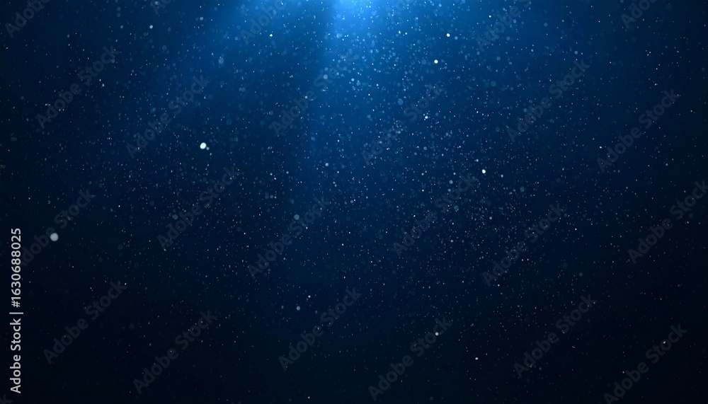 Naklejka premium Floating dust particles illuminated by a single cinematic beam of light on a dark gradient background