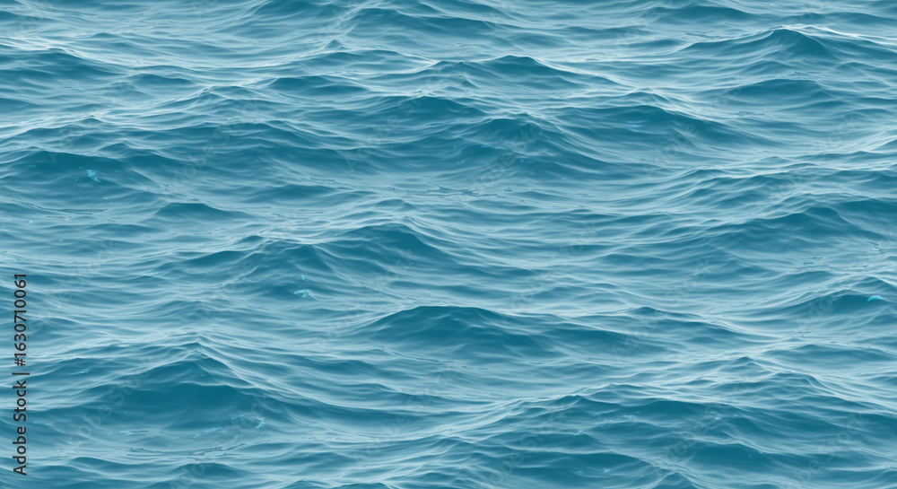 Naklejka premium Soft Ocean Ripples Under Daylight