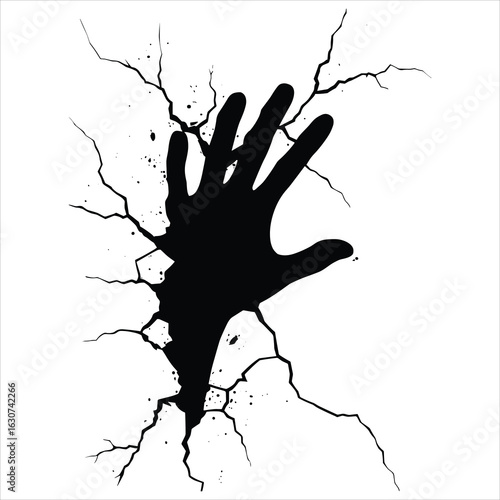 Silhouette of a hand breaking through a cracked wall