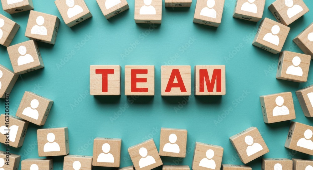 Naklejka premium Teamwork and Collaboration Concept with Wooden Blocks Spelling Out TEAM Surrounded by Cubes with Person Icons