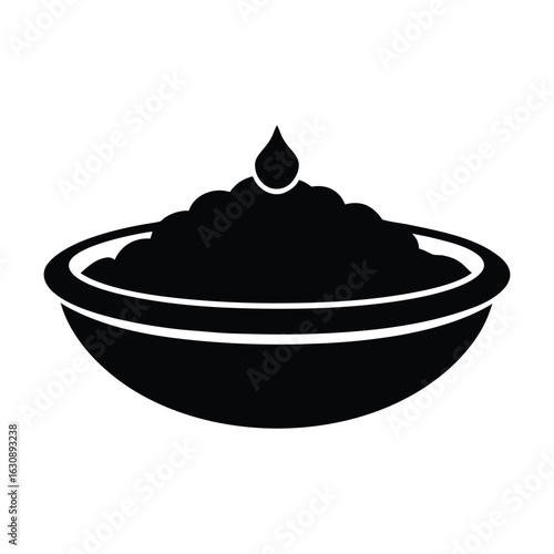 Black silhouette of a bowl of mashed potatoes with a drop of gravy food