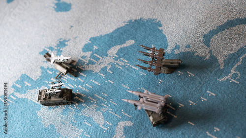 Foto the missiles launcher model and map on Europe, Russia-Ukrainian boundary