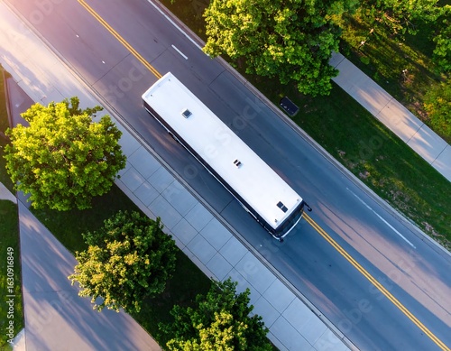 City bus on urban road, overhead view