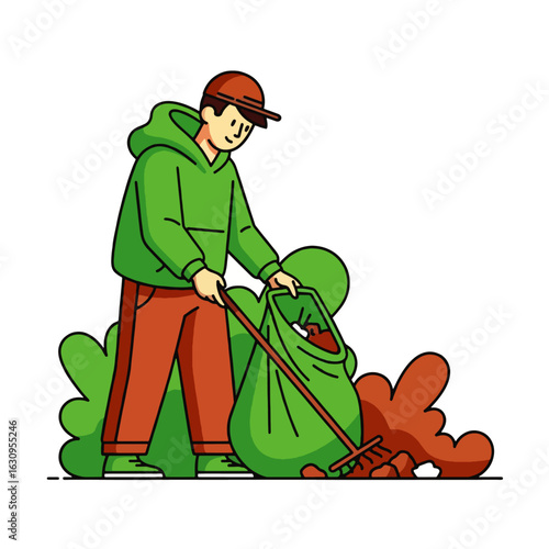 A man wearing a hoodie and cap rakes leaves into a large green bag, tidying the garden.