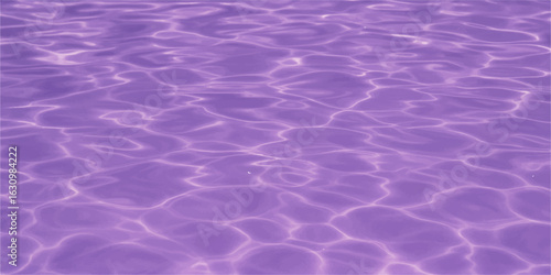 Blue water surface with clear ripples and reflections in a swimming pool or ocean background