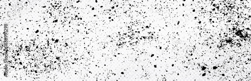 Black ink splatter texture isolated on white transparent background. Abstract grunge background with scattered dots and smudges. Minimalist gritty surface design