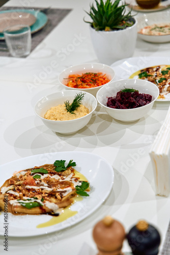 Wallpaper Mural A Deliciously Plated Assortment of Colorful Culinary Delights Featuring Fresh Ingredients on a Modern Dining Table Torontodigital.ca