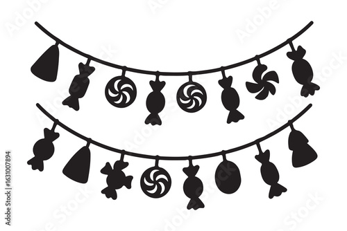 Black candy ornaments on strings white