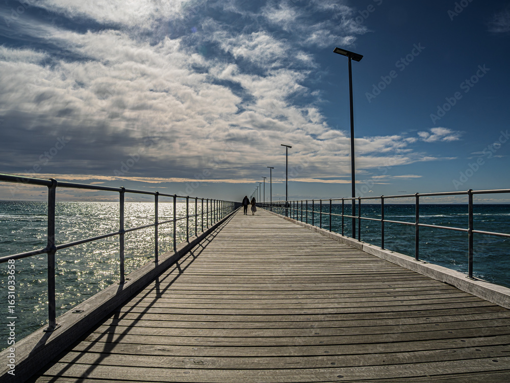 Fototapeta premium View Up Rye Pier Into The Sun