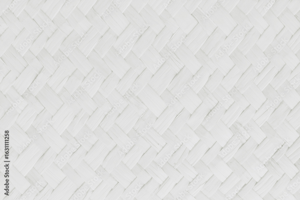 Fototapeta premium White reed weaving mat texture background with vintage style.
