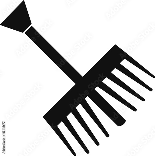 Black silhouette of a garden rake isolated on white background