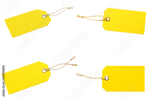 Four yellow rectangular price tags with strings, isolated on white background for retail, sales, and product labeling