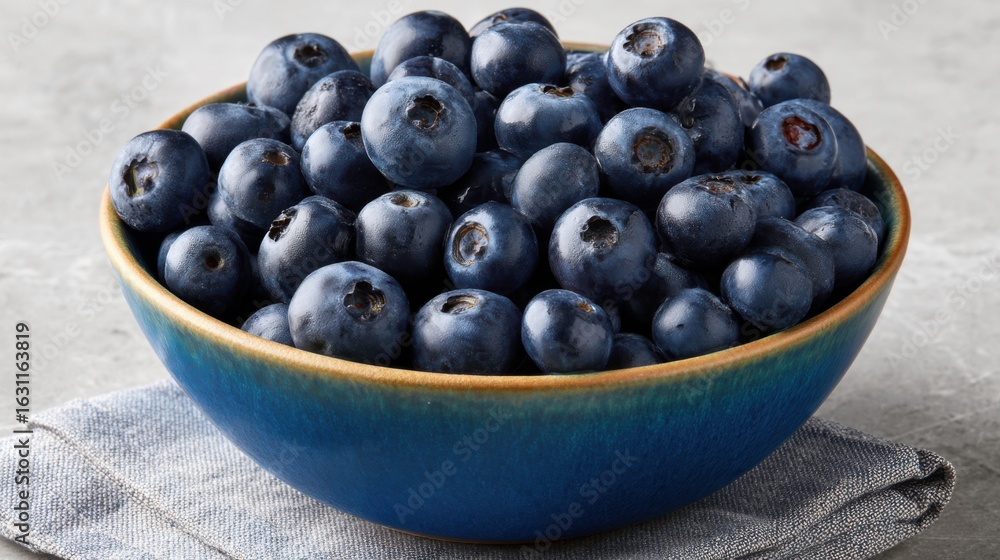 Blueberries bowl on table delicious fruit kitchen close-up view nutritional benefits Blueberries bowl on table delicious fruit kitchen close-up view nutritional benefits