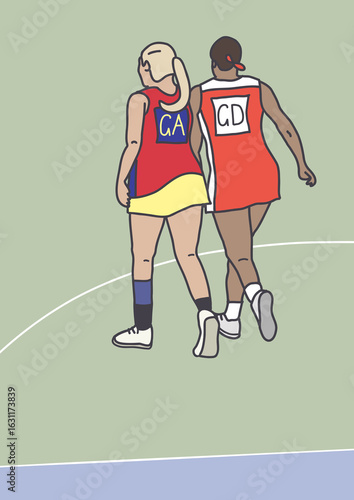 Two women in action on netball court on game day