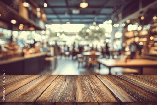 Wallpaper Mural Empty wooden table in a busy cafe.  Blurred interior, people, and food Torontodigital.ca