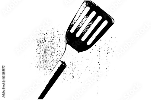 Vector Black slotted turner with speckled texture.