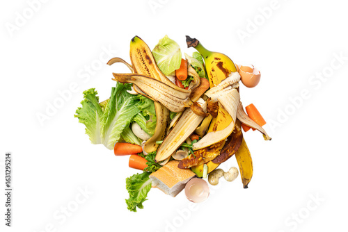 Pile of organic food scraps including banana peels and lettuce isolated on transparent background