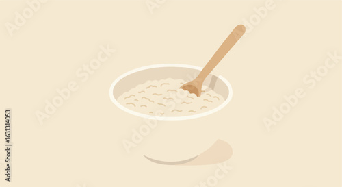 Bowl of oats with spoon on a neutral background, as an icon for healthy living