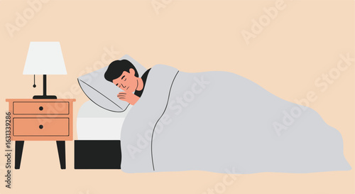 Man sleeping in bed next to a lit lamp, with a nightstand in the background