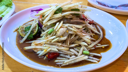 Spicy papaya salad with salted crab and fermented fish