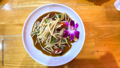 Spicy papaya salad with salted crab and fermented fish