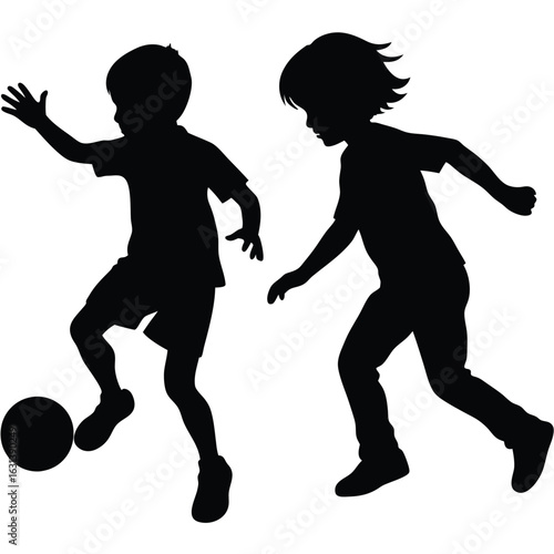 Two children playing soccer in dynamic black silhouette