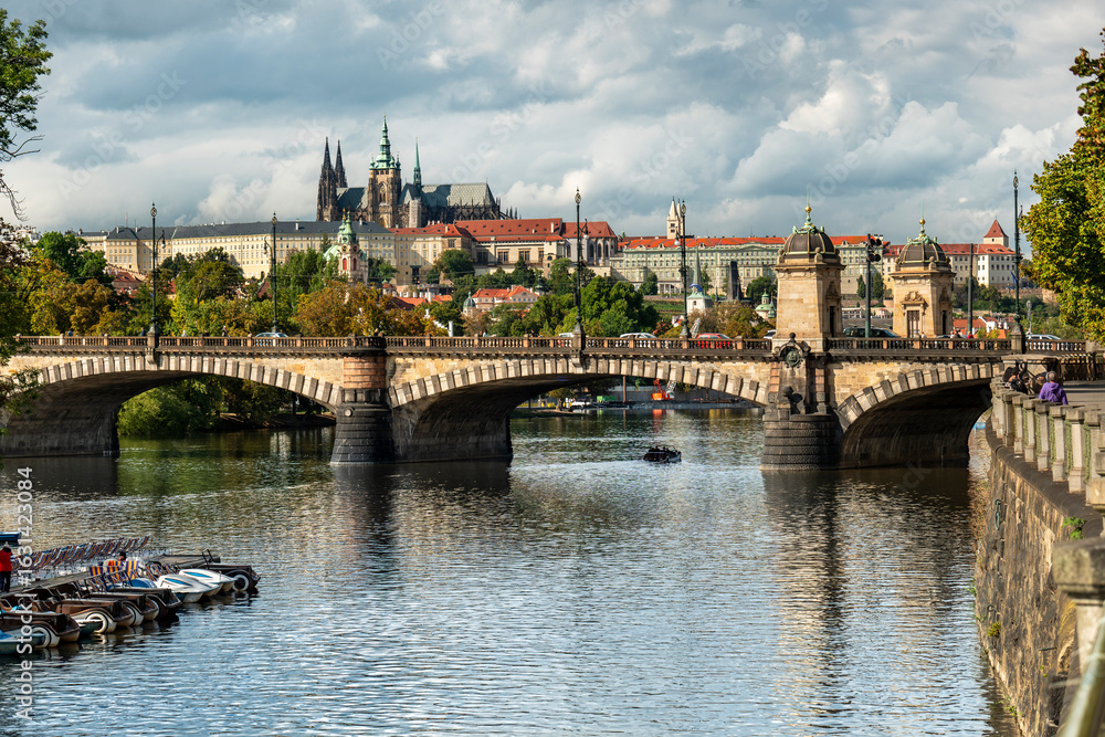 Obraz premium Prague Castle and Legion Bridge over Vltava River, Czech Republic