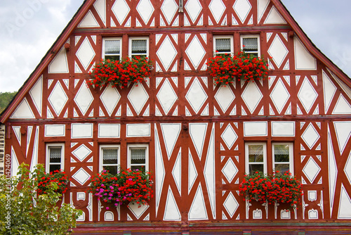 Foto colourful half-timbered house in Treis-Karden along the river Moselle in German