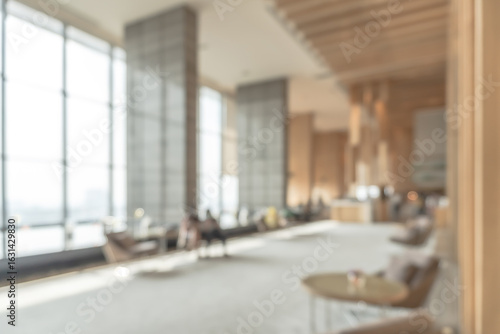 Φωτογραφία Blurred business office building lobby or hotel blur background interior view to