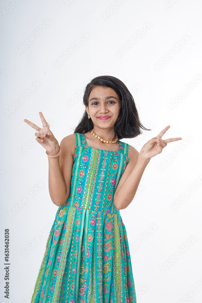 indian girl traditional wear giving happy expression indian girl traditional wear giving happy expression